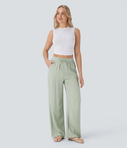 Pantalones informales de corte ancho con cintura alta, cordón ajustable y bolsillos con tacto de lino