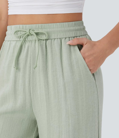 Pantalones informales de corte ancho con cintura alta, cordón ajustable y bolsillos con tacto de lino