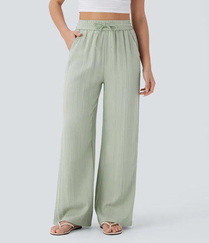Pantalones informales de corte ancho con cintura alta, cordón ajustable y bolsillos con tacto de lino